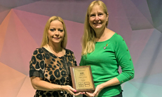 Lydia Bartram and Susannah Brown hold Chapter Challenge Award