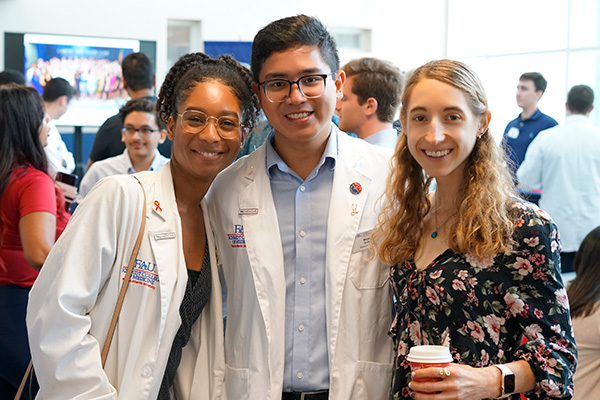 FAU M.D. students inside lobby at the Schmidt College of Medicine building