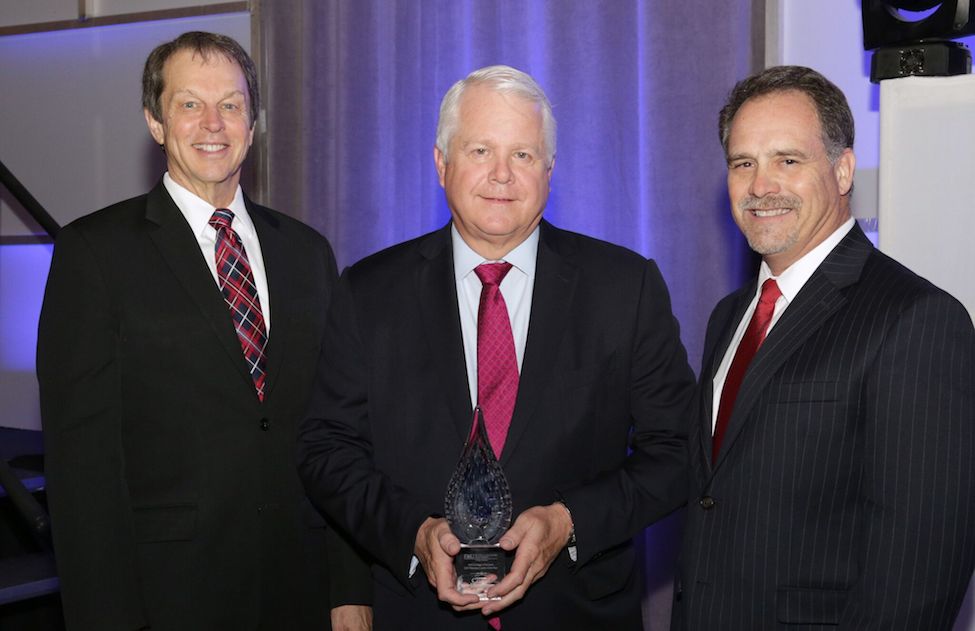 Pictured left to right are FAU President John Kelly, 2017 Business Leader of the Year Colin Brown, chairman and chief executive officer of JM Family Enterprises, Inc., and FAU College of Business Dean Daniel Gropper.