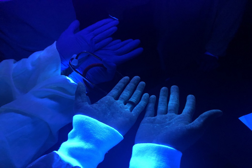 FAU  Ultraviolet Light Exposes Contagion Spread from Improper PPE Use