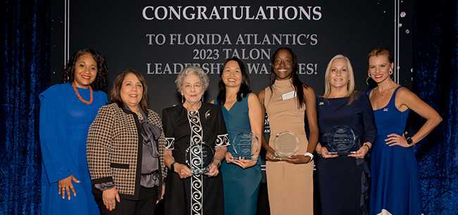 From left, Justine Avila, chair of the FAU Alumni Association Board; FAU President Stacy Volnick ’87, ’06, ’22; philanthropist Ann Wood; Jennifer Caceres, M.D., FACP, senior associate dean for student affairs and associate professor in the Charles E. Schmidt College of Medicine; Kaylia Cooper, FAU student; Debbie Levine, CFRE, ’93; Katie Burke, Ph.D., ’08, ’10, ’15, ’17, assistant vice president of alumni and community engagement, attend the 2023 Talon Leadership Awards.