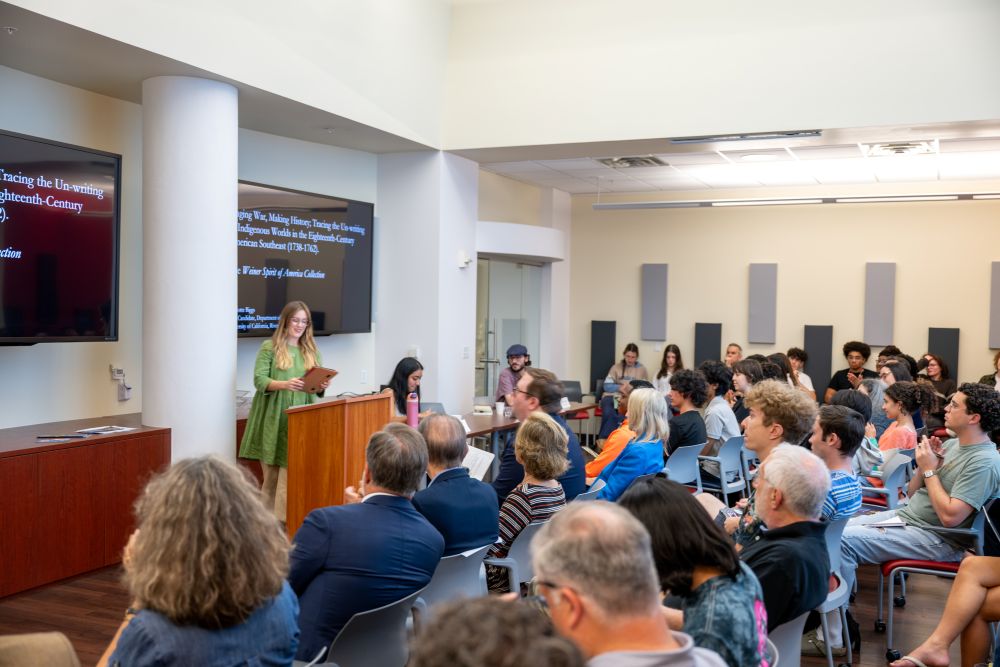 Female student in front of Podium