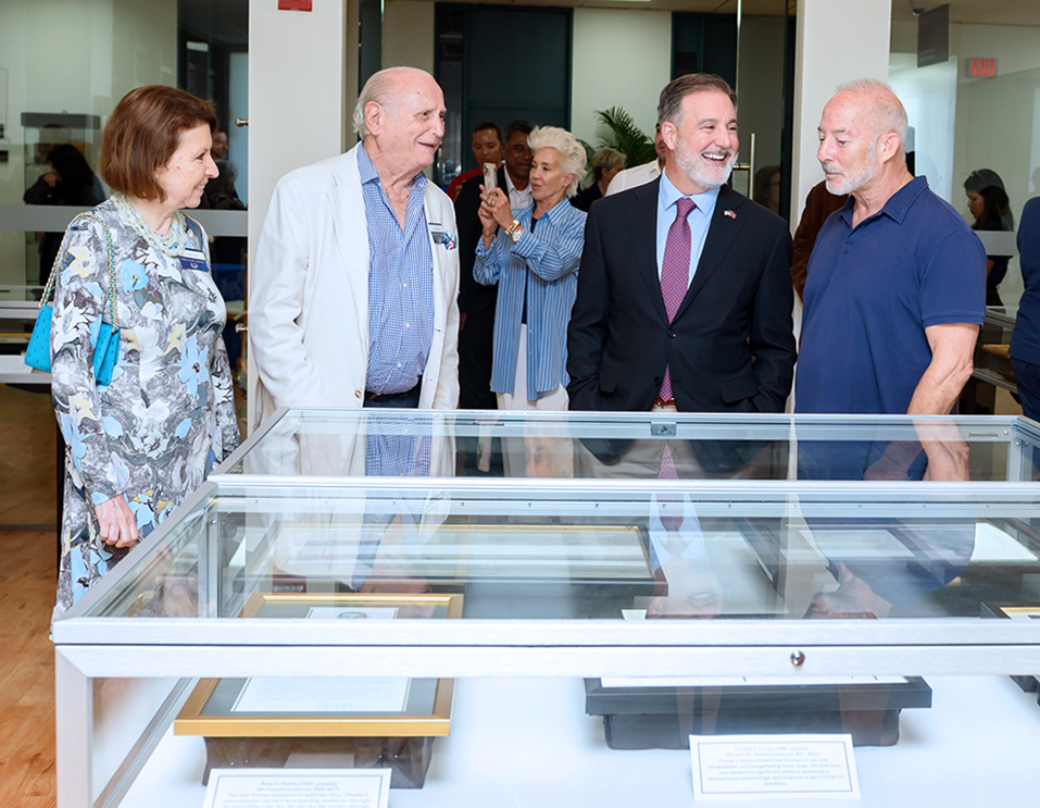 From left, Melanie Cabot; Irwin Kudman; FAU President Adam Hasner; and Jonathon Larkin at the opening of the Alan B. and Charna Larkin American Presidential Study within the S.E. Wimberly Library at the Boca Raton campus.  