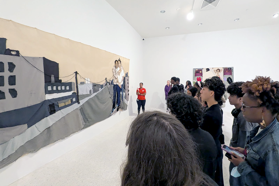 CREATE students at the NSU Art Musuem looking at artwork on the wall