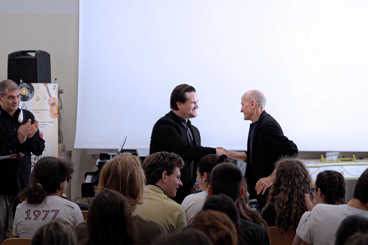 Dr Mitchell Hutchings and Prof Federico Bardazzi at an outreach concert at the State Institute of Art Felice Palma in Massa Italy.jpg