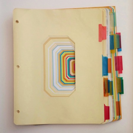 The Passion of Daedalus, an example of Broderick’s paper constructions made out of hand-cut reclaimed three-ring binder tab dividers