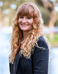 Headshot of Angela Nichols, smiling