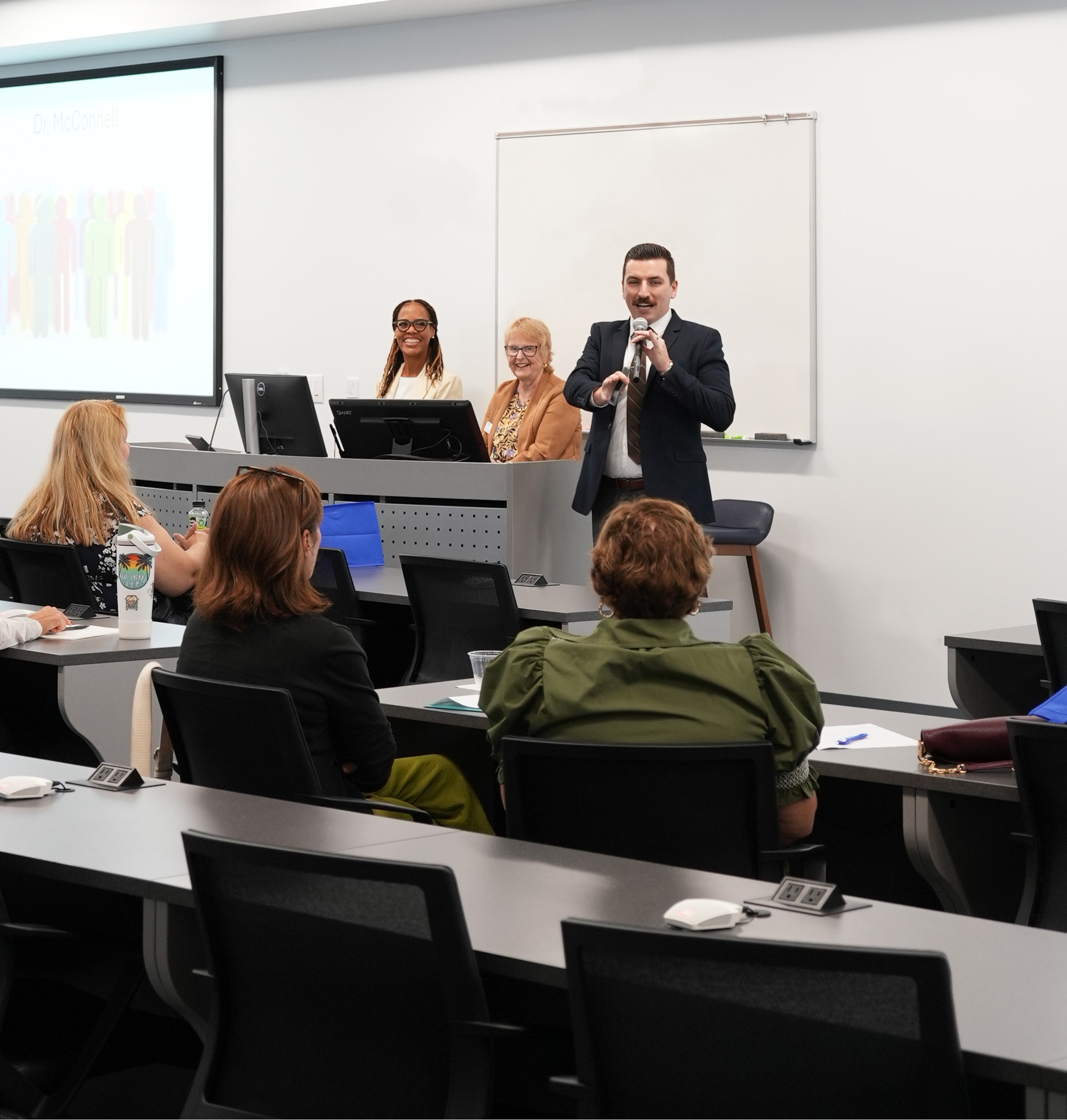 Dr.McConnell speaking to guests.