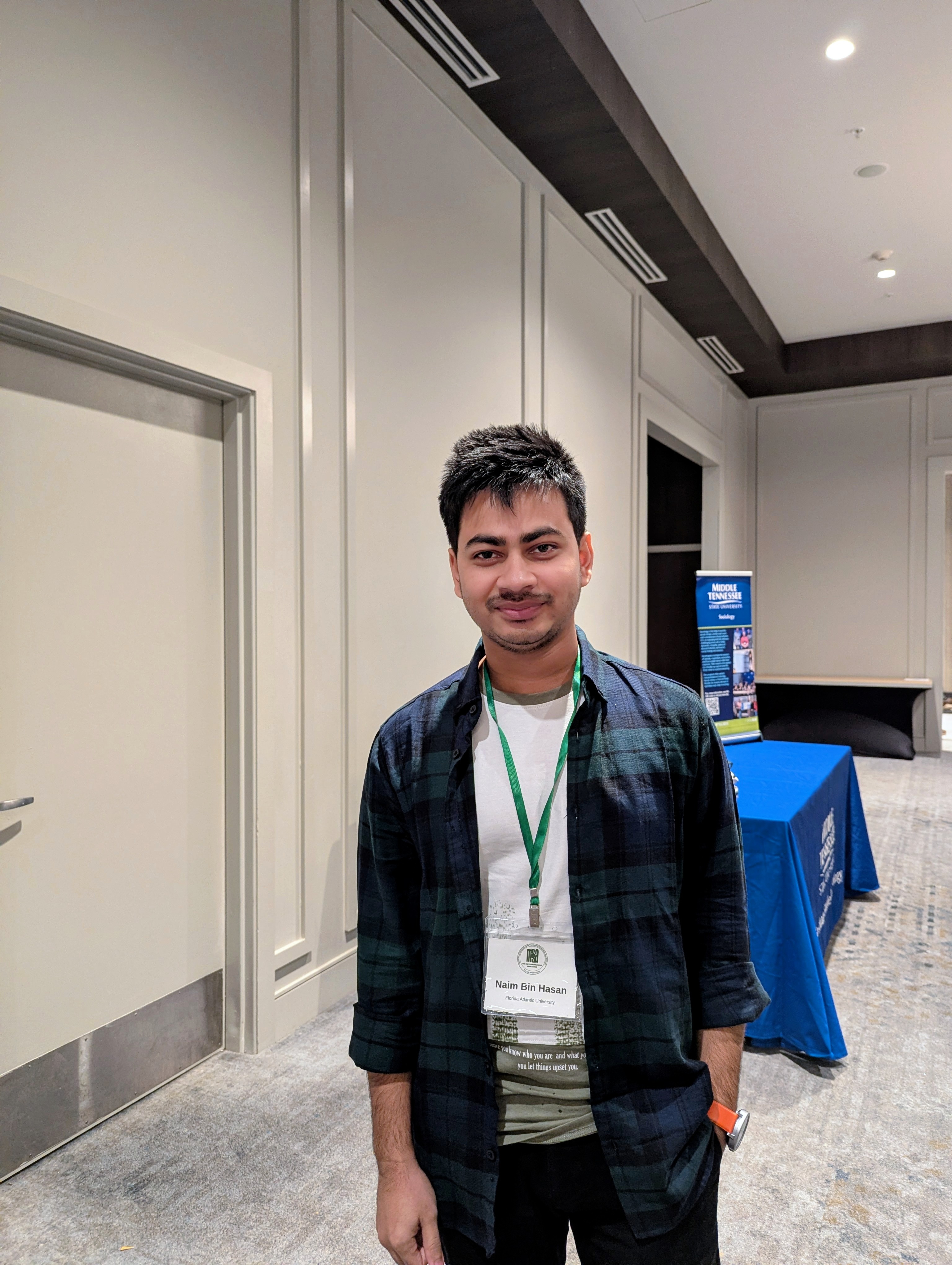 Graduate Student Naim Bin Hasan posing for a picture.