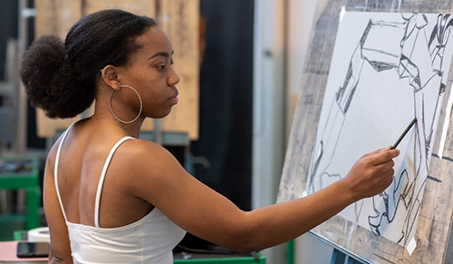 girl at easel, drawing