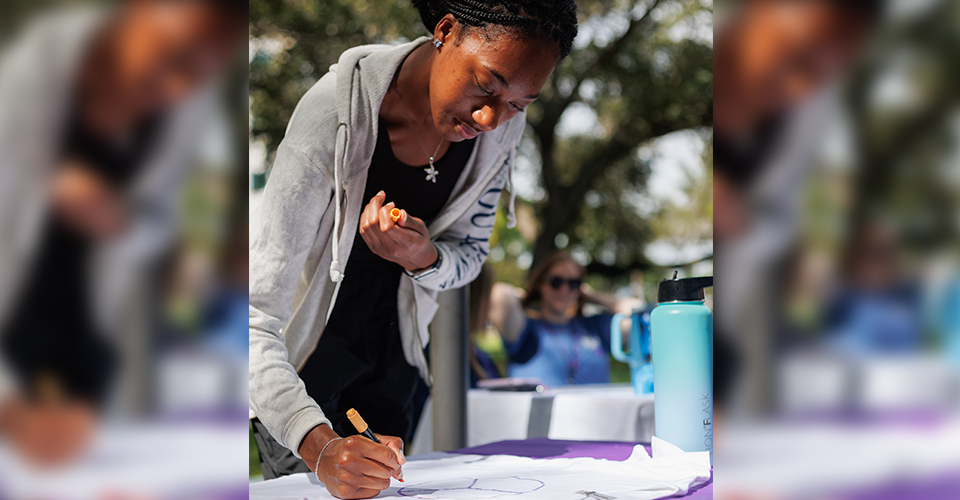 student signing in for registration 