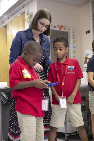 children and a teacher learning