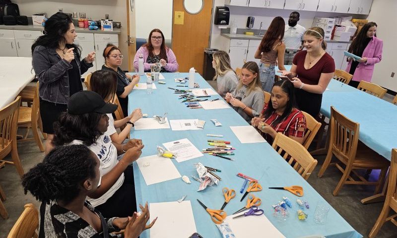 people working around a table