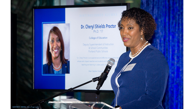 Cheryl Shields Proctor, Ph.D. '17, FAU College of Education, accepting the FAU 2022 FAU Distinguished Alum.