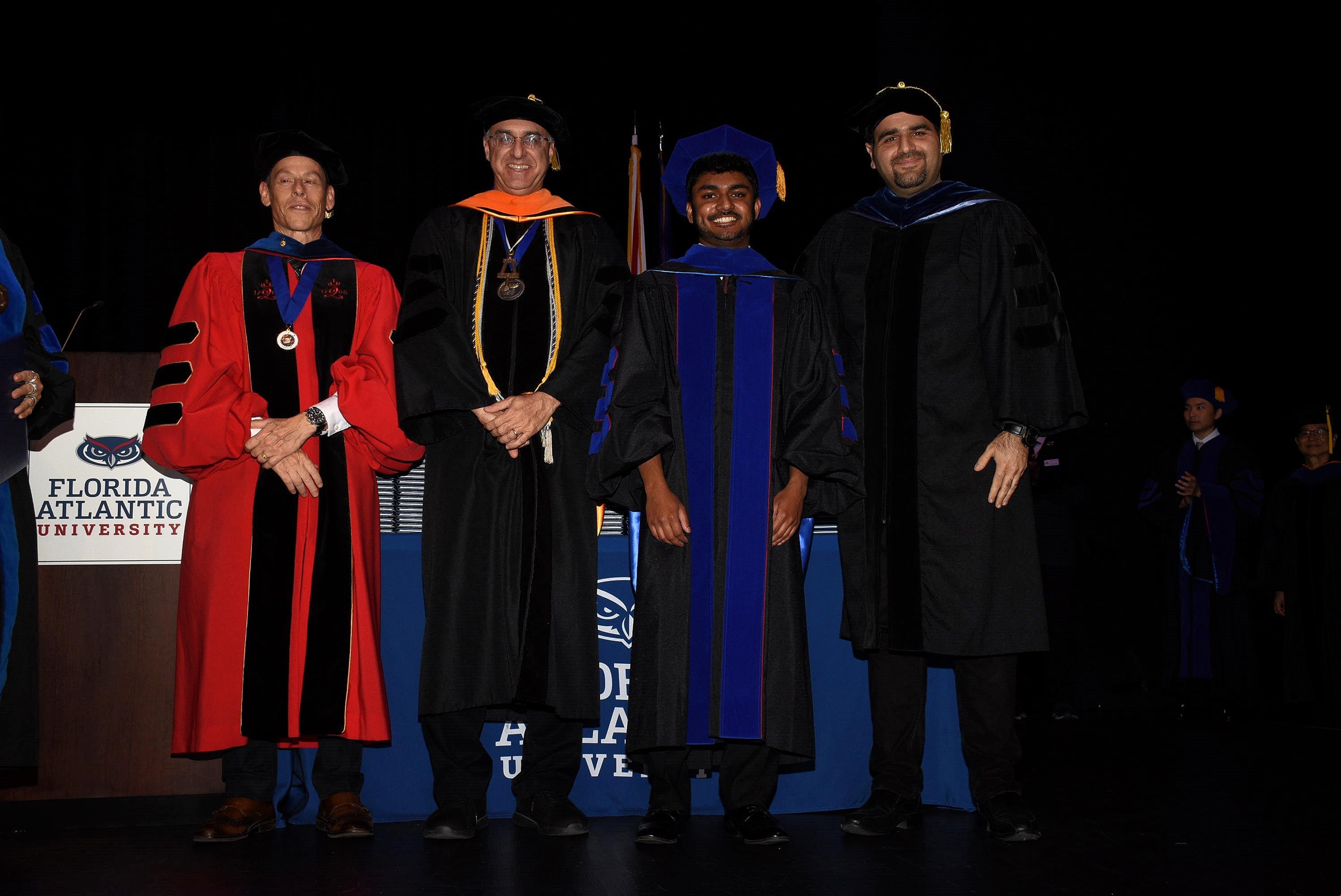 Image of Dr. Vithulan Suthakaran with other FAU faculty.