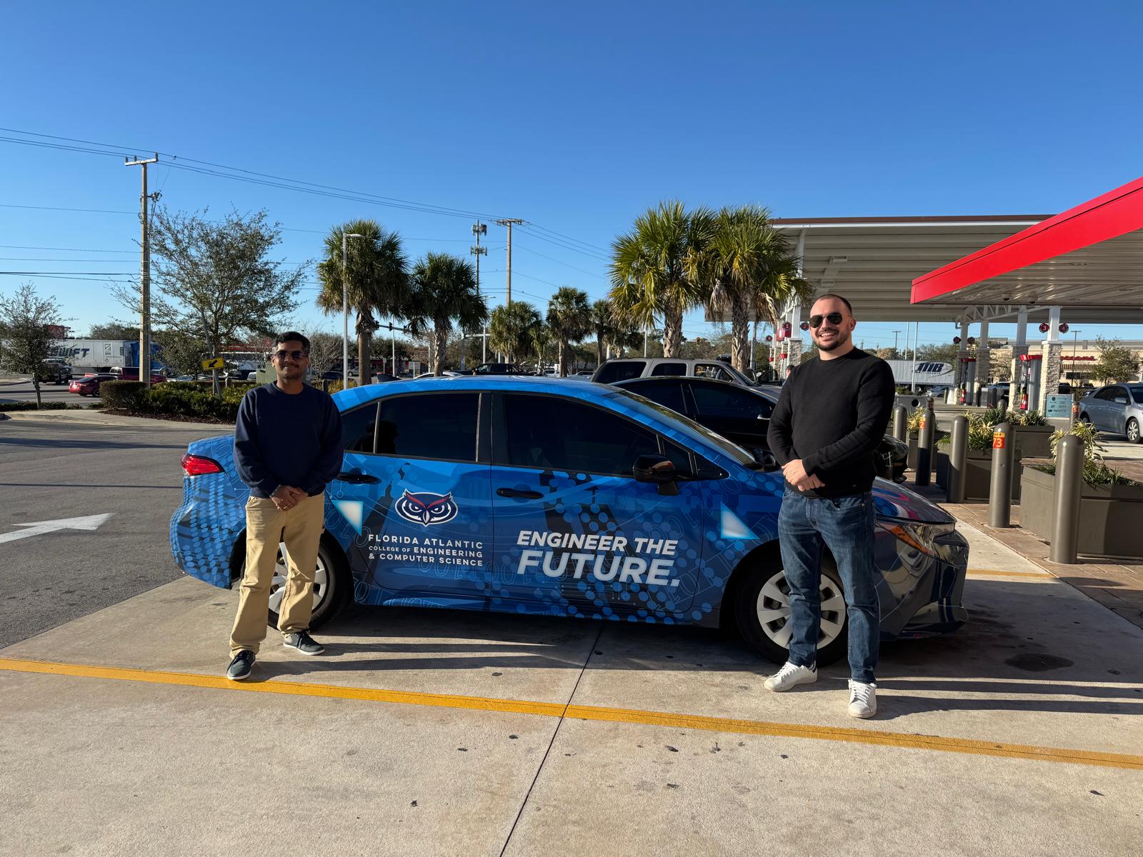 FAU students by CEGE car.