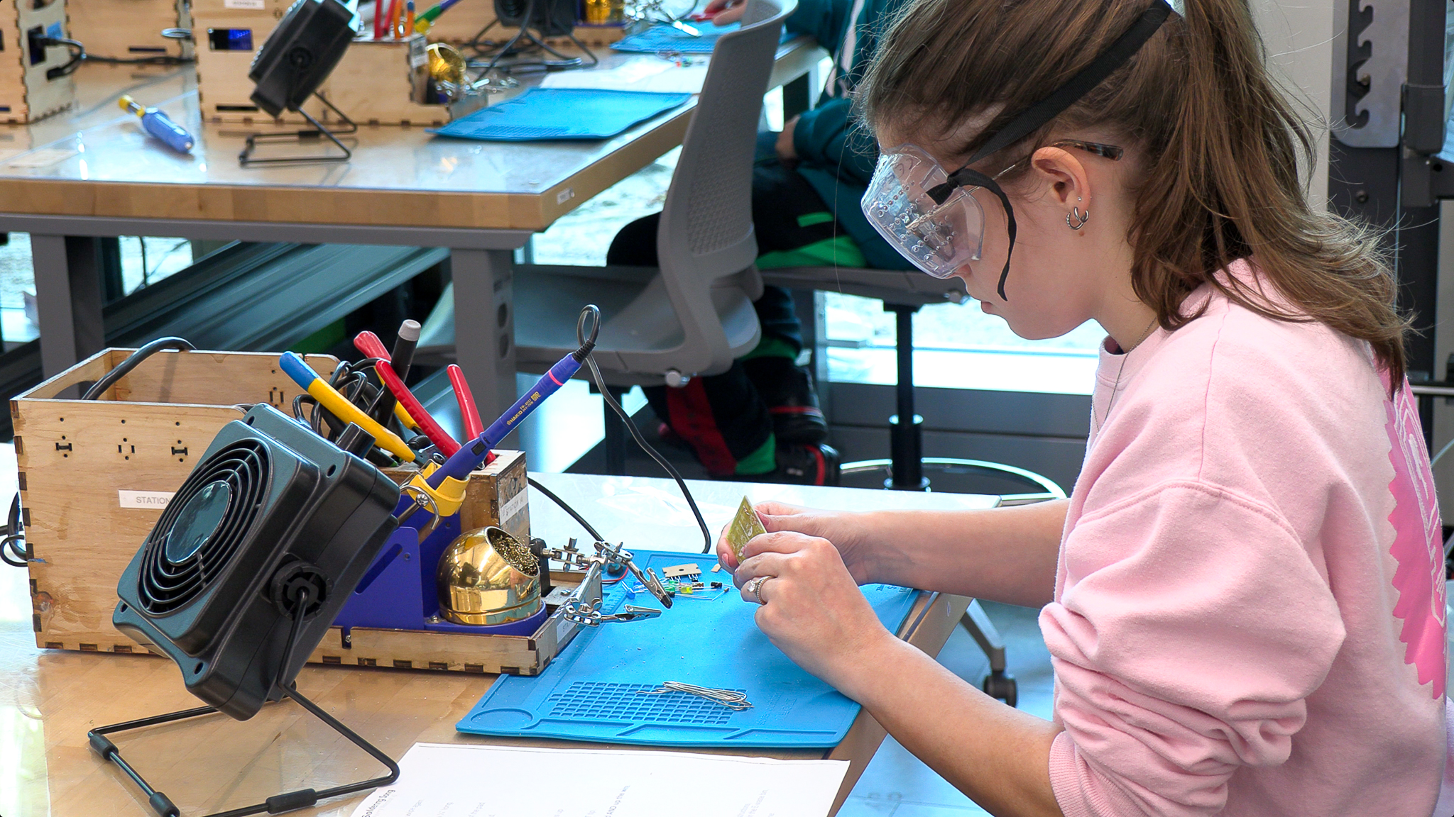 Student Soldering Semiconductor