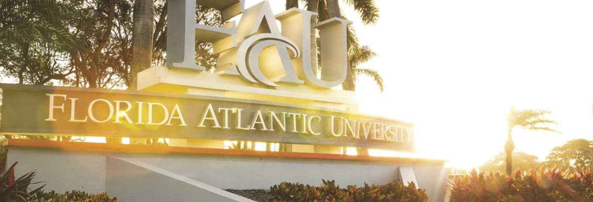 FAU campus entrance sign in sunlight