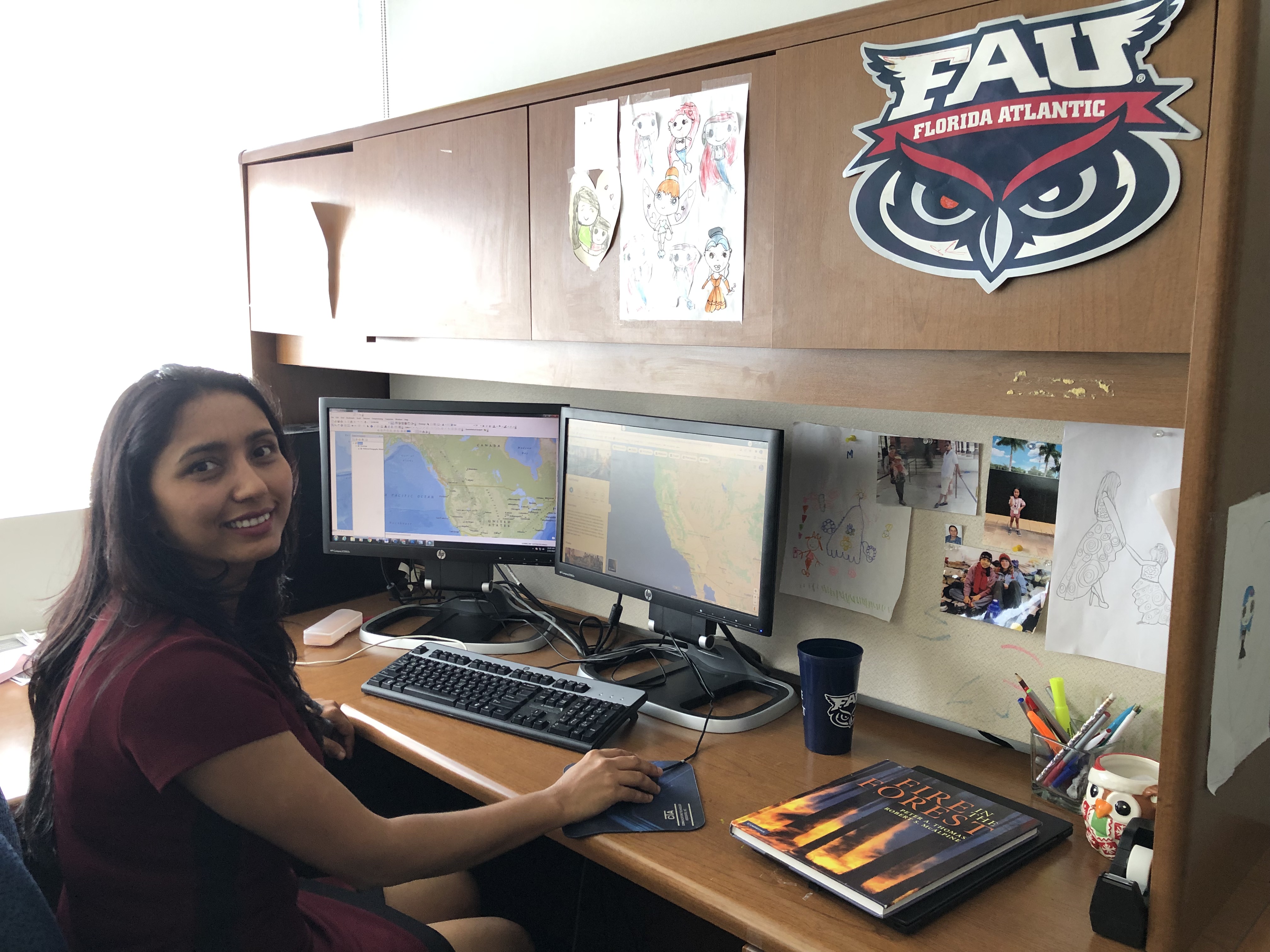asha at her desk