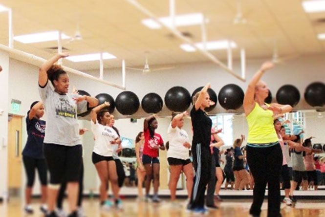 a group of people at a fitness class