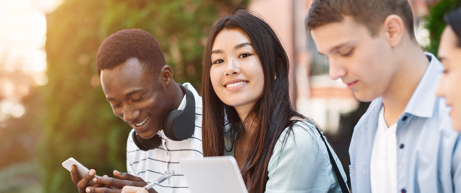 Four Students Smiling