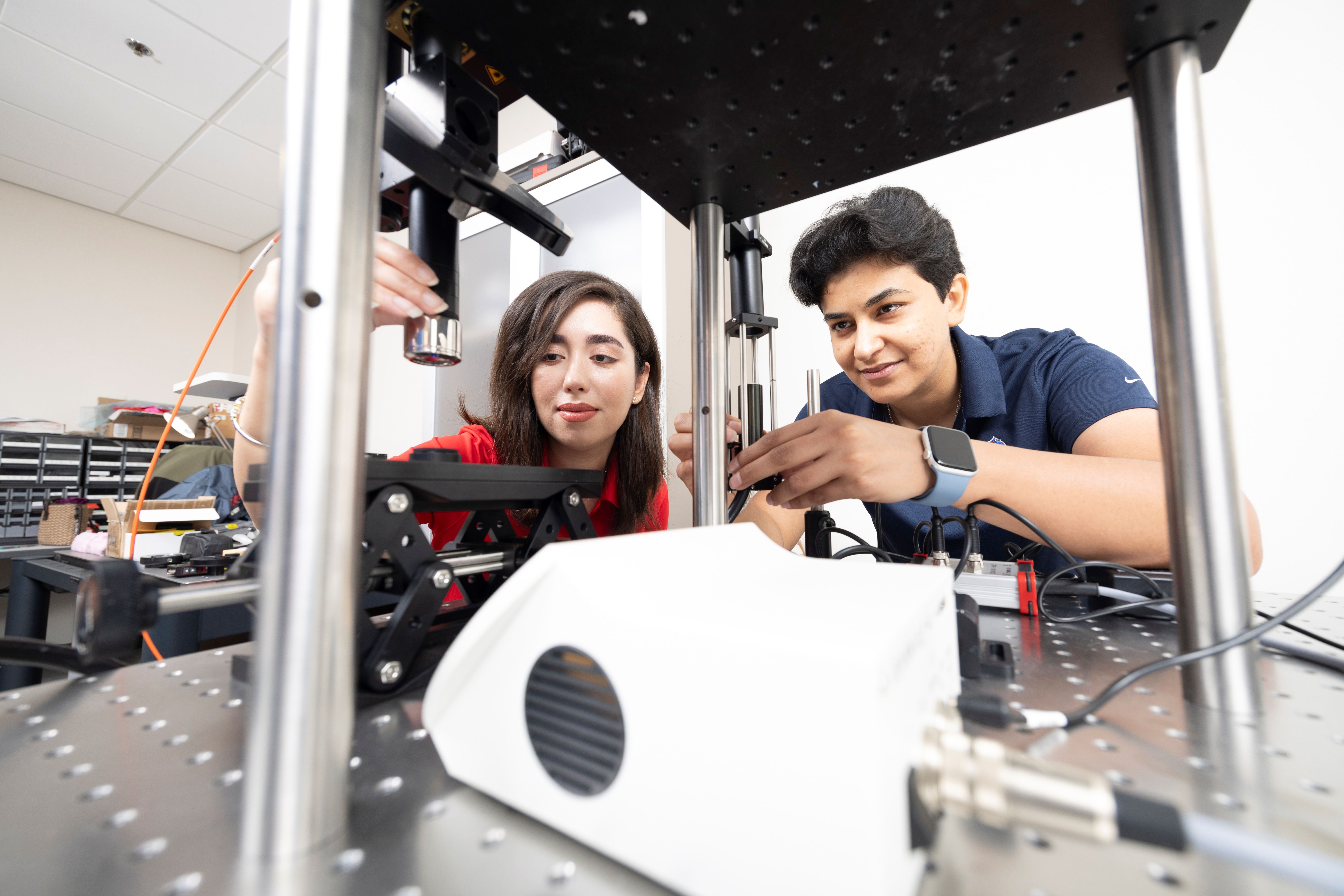 Two students working in the lab