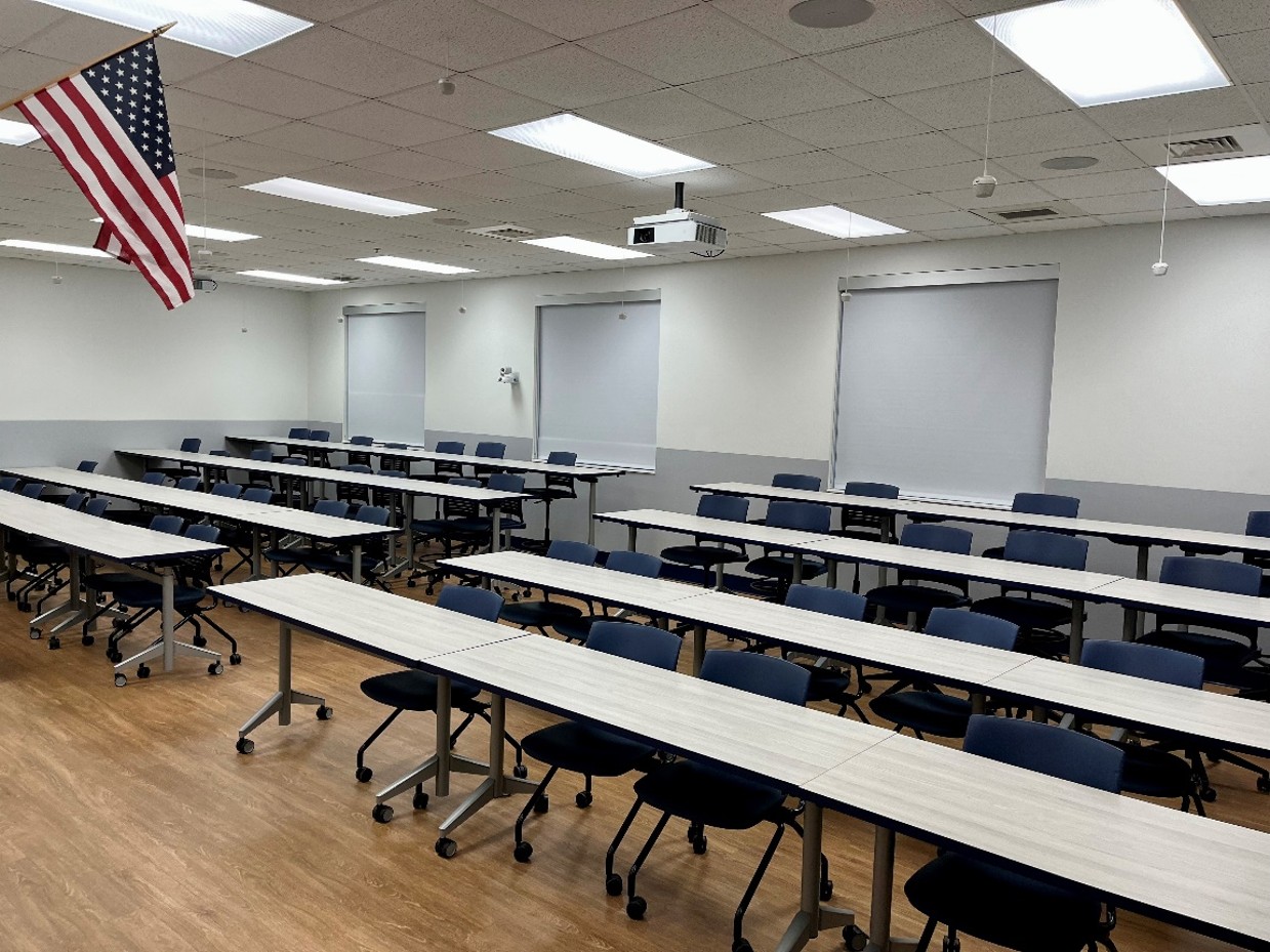 front view of classroom with tables and 50 chairs