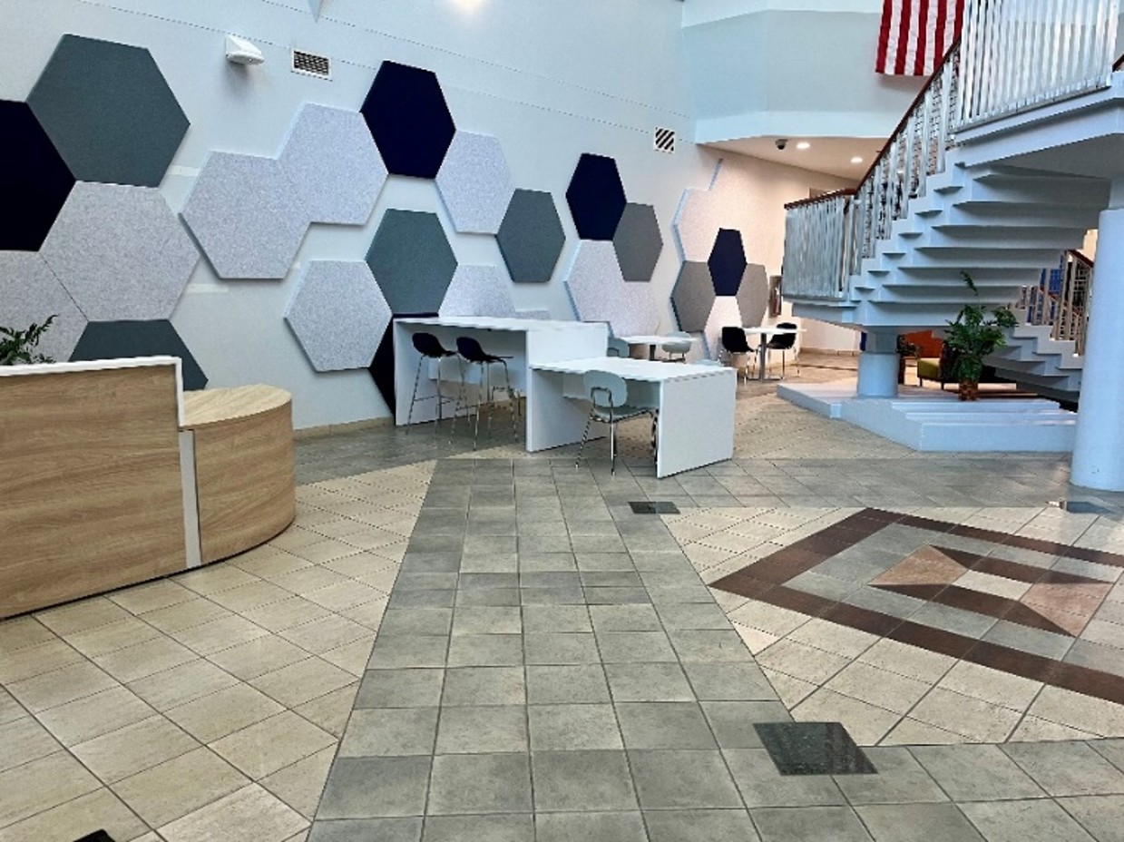 close-up view of lobby with chairs and sofas
