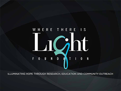 Logo featuring the words 'WHERE THERE IS LIGHT FOUNDATION' in white, with the word 'Light' in a large serif font and a decorative teal script 'g' that loops downward, set against a dark, abstract curved background.