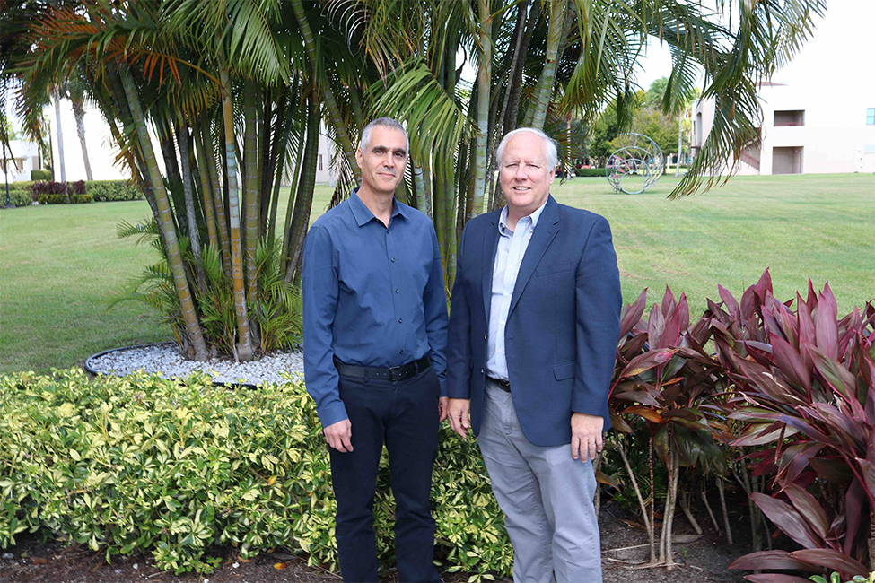 Uri Ashery, Ph.D., professor of Neurobiology and head of the Sagol School of Neuroscience at Tel Aviv University, with Randy D. Blakely, Ph.D., professor of Biomedical Science in the Charles E. Schmidt College of Medicine and executive director of the FAU Brain Institute