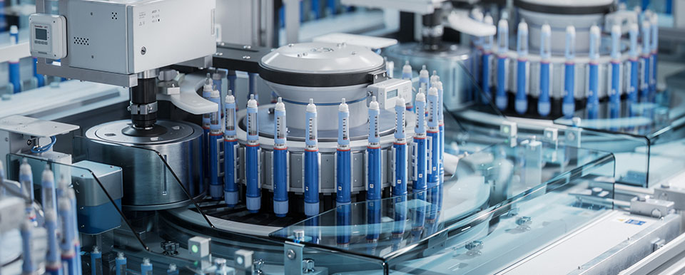 Medical Injector on Conveyor Line during Production Process at Modern Pharmaceutical Factory