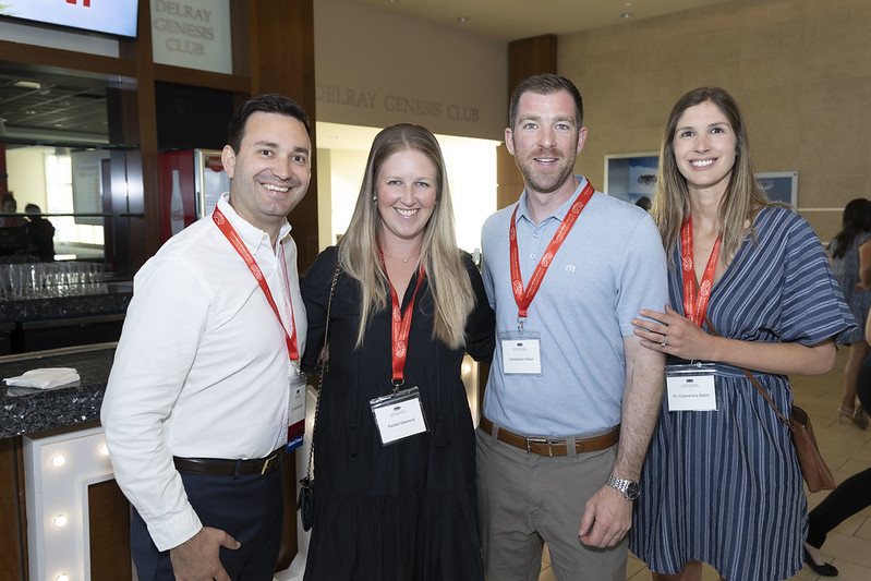 Dr. Kyle Diamond with wife Rachel and classmate Dr. Cassandra Balon with husband Chris