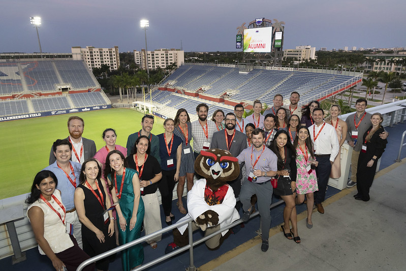 FAU College of Medicine alumni with Owlsley at FAU Stadium.