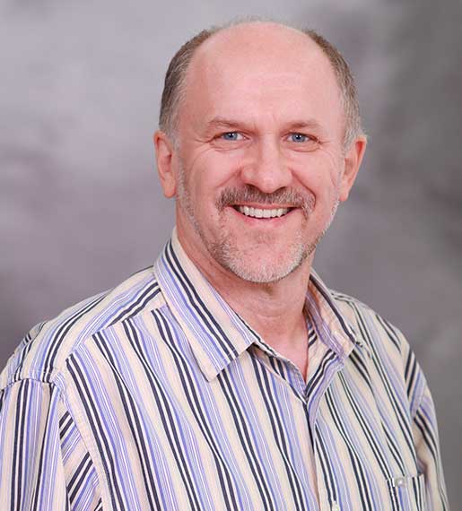 Headshot of Dr. Andrew Oleinikov