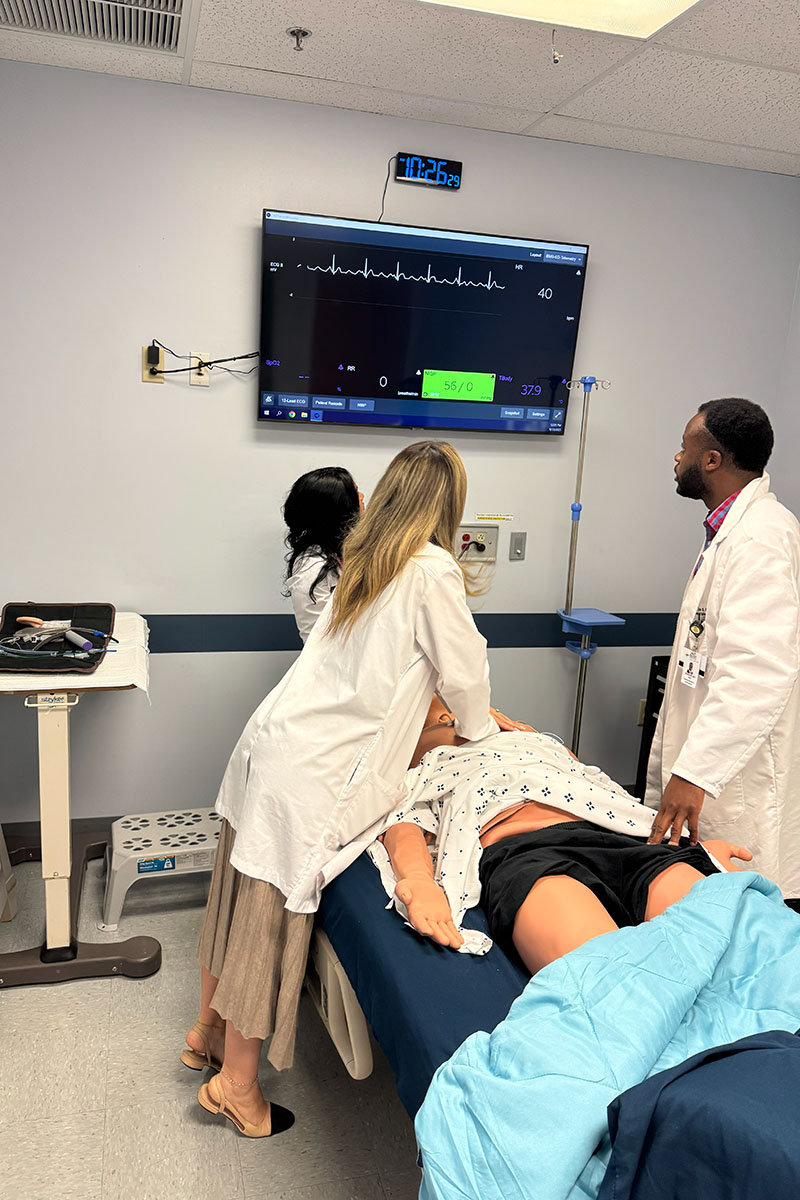 Resident participating in a simulation training exercise