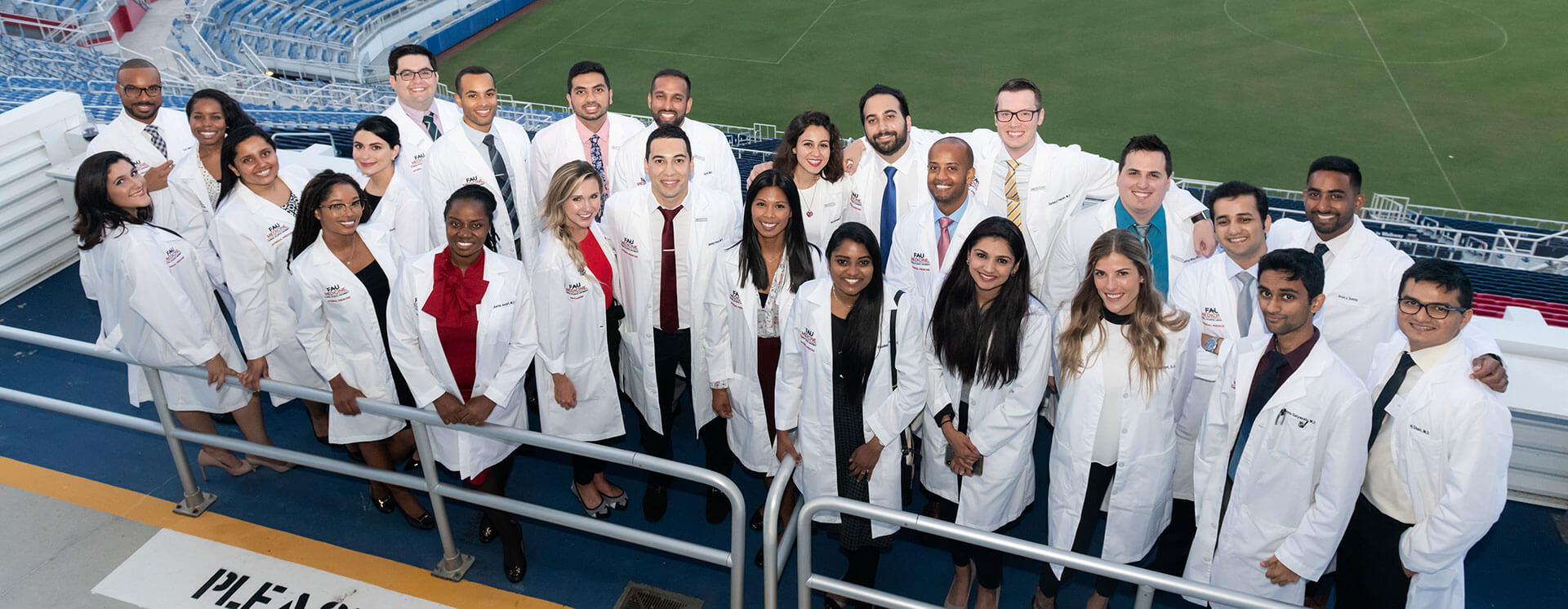 FAU Internal Medicine residents and faculty in the FAU Owls Football Stadium
