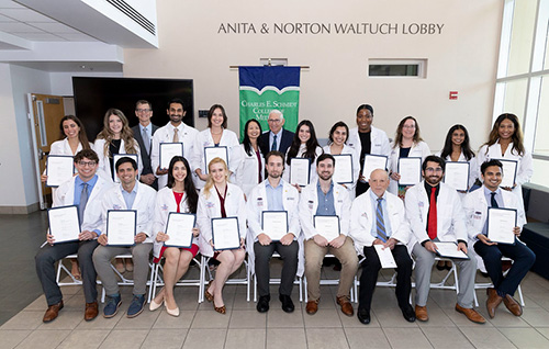 Gold Humanism inductees 2026 group photo in the Waltuch Lobby of the Schmidt College of Medicine