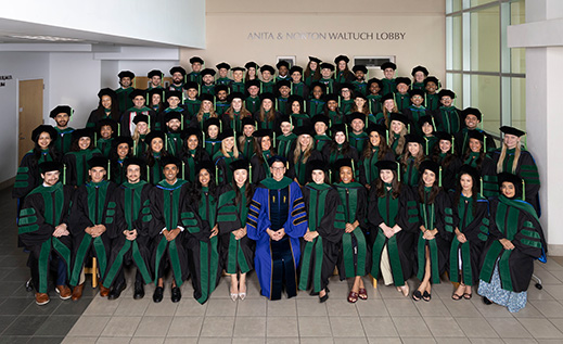 FAU Schmidt College of Medicine MD graduates taking group picture in Waltuch Lobby
