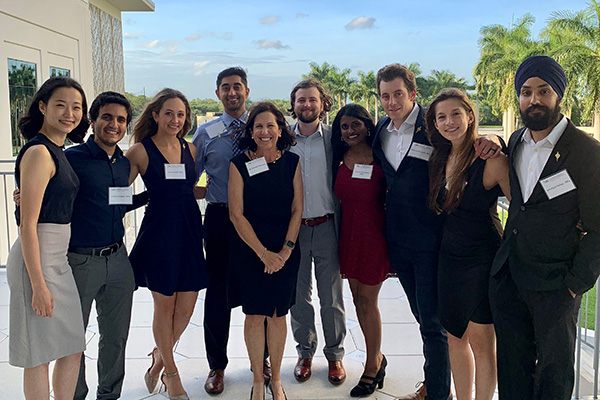 FAU M.D. students on Schmidt College of Medicine building rotunda