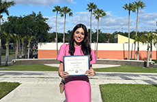 Dr. Lea Sacca with award