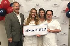Jaclyn Klimczak with family and friends, along with Owlsley, at the FAU Hall of Fame and Distinguished Alumni Award Ceremony