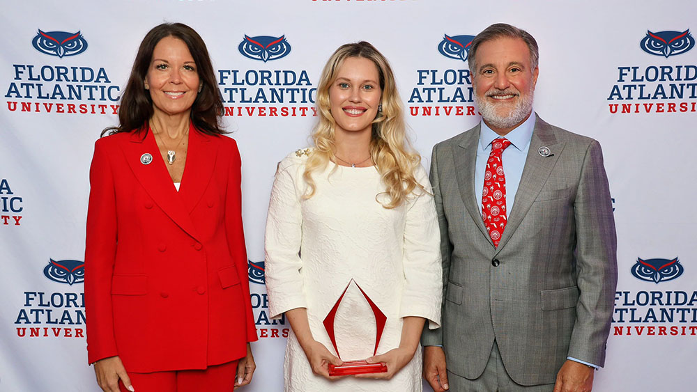 Dr. Klimczak with FAU President Adam Hasner