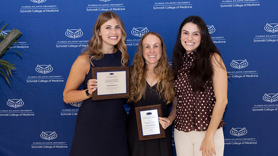 Group photo with Abbigail Shrontz and Carrie Stucken, MD with awards