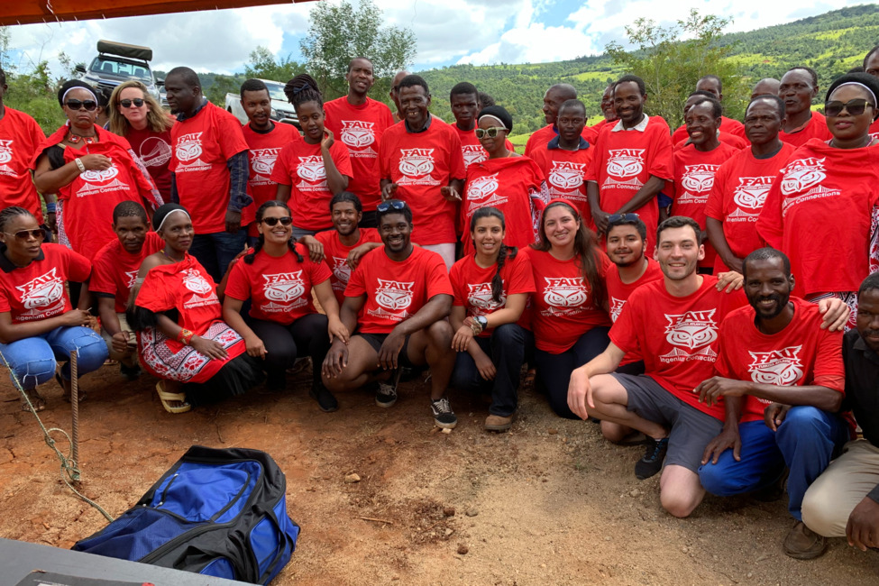 FAU civil engineering students pose with community members in Eswatini during Bridge Program construction