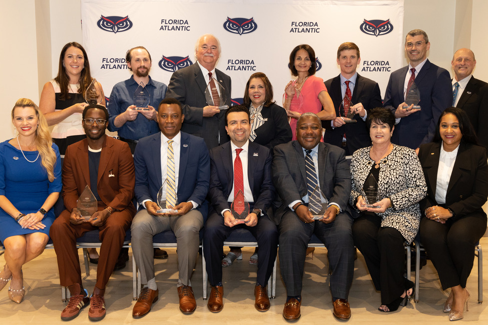 Florida Atlantic University Alumni and Community Engagement hosted its annual Hall of Fame and Distinguished Alumni Award Ceremony and Reception. In attendance were, front row, from left, Katie Burke, Ph.D., assistant vice president of alumni and community engagement; Woody De Othello; Rigaud Joseph, Ph.D.; Pablo Paez; Ted Toomer, Ed.D.; Jean Seaver; and Justine Avila, chair of the FAU Alumni Association Board. Back row, from left, Carly Yoost; Daniel Chauss, Ph.D.; Phillip Parker; FAU President Stacy Volnick, Ph.D.; Angela S. Prestia, Ph.D.; Edward Fulton, M.D.; Mihai Fonoage, Ph.D.; and David Green, interim vice president of institutional advancement.