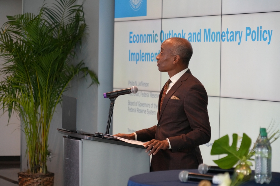 A man stands at a podium