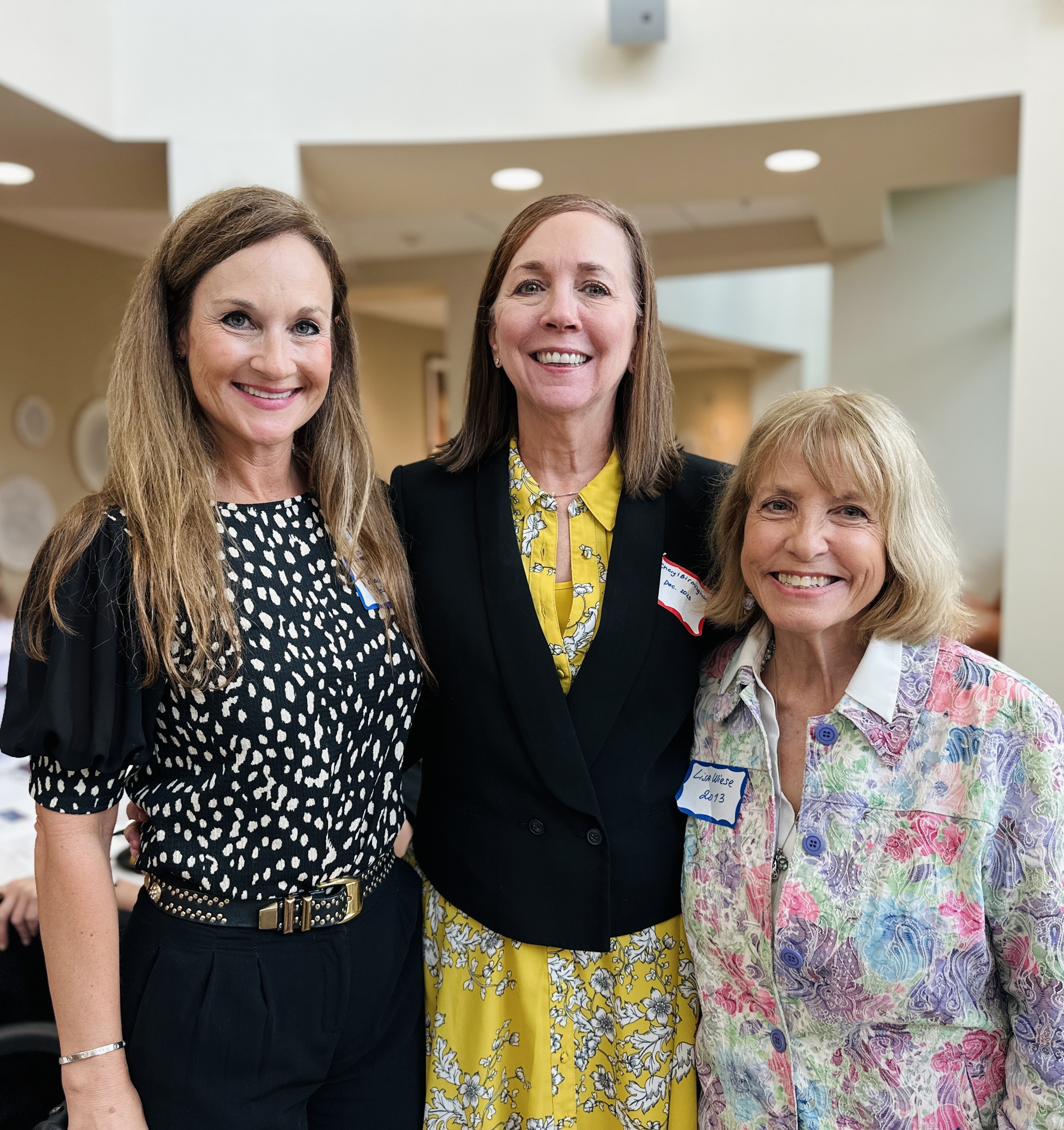 Three female alumni