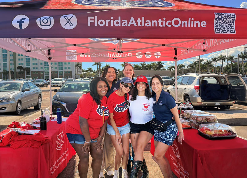 FAU Online Enrollment and Student Success team at an event with Online Student Adivsory Board student representatives.