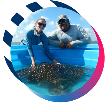 man and woman with eagle ray