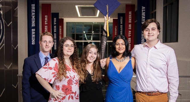 Five FAU Kelly/Strul Emerging Scholars pose for a photo